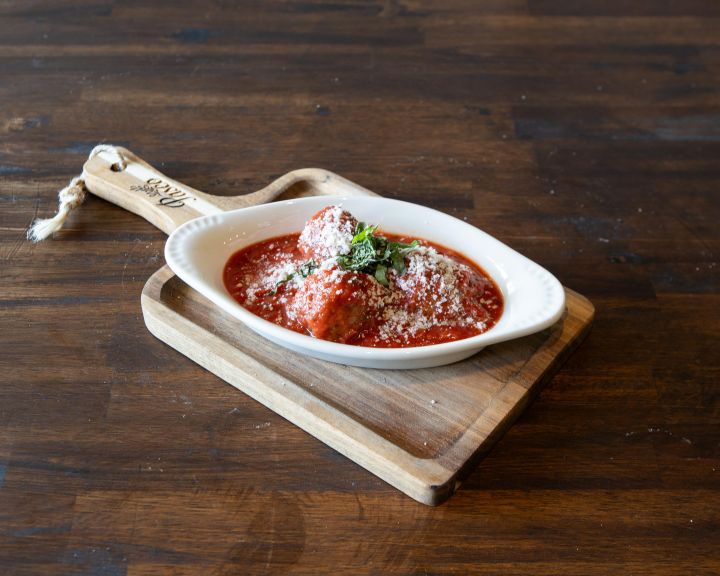 Paseo meatballs in San Marzano tomato sauce with Parmesan and fresh herbs