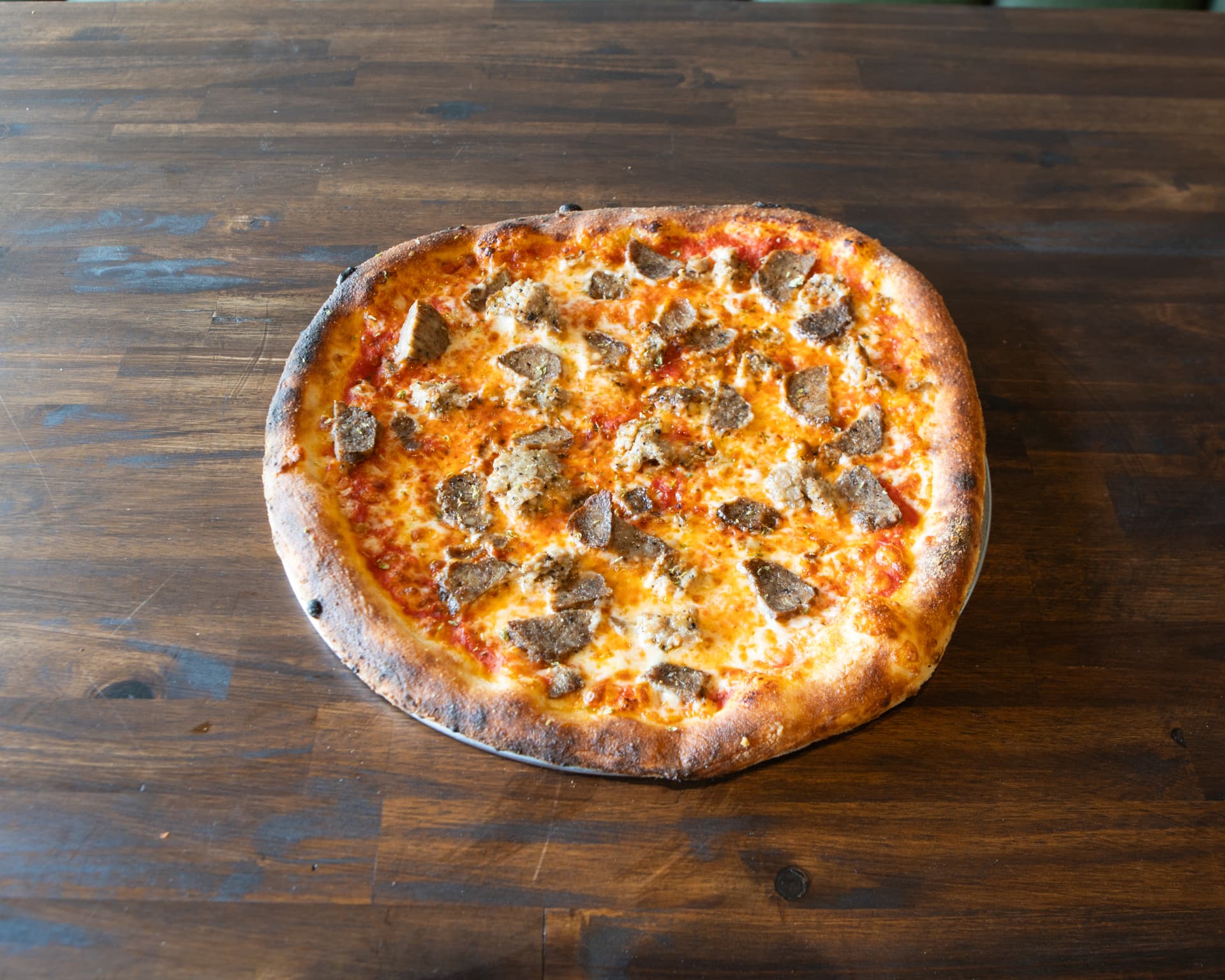 The Papa pizza with shaved house-made meatballs and Italian sausage
