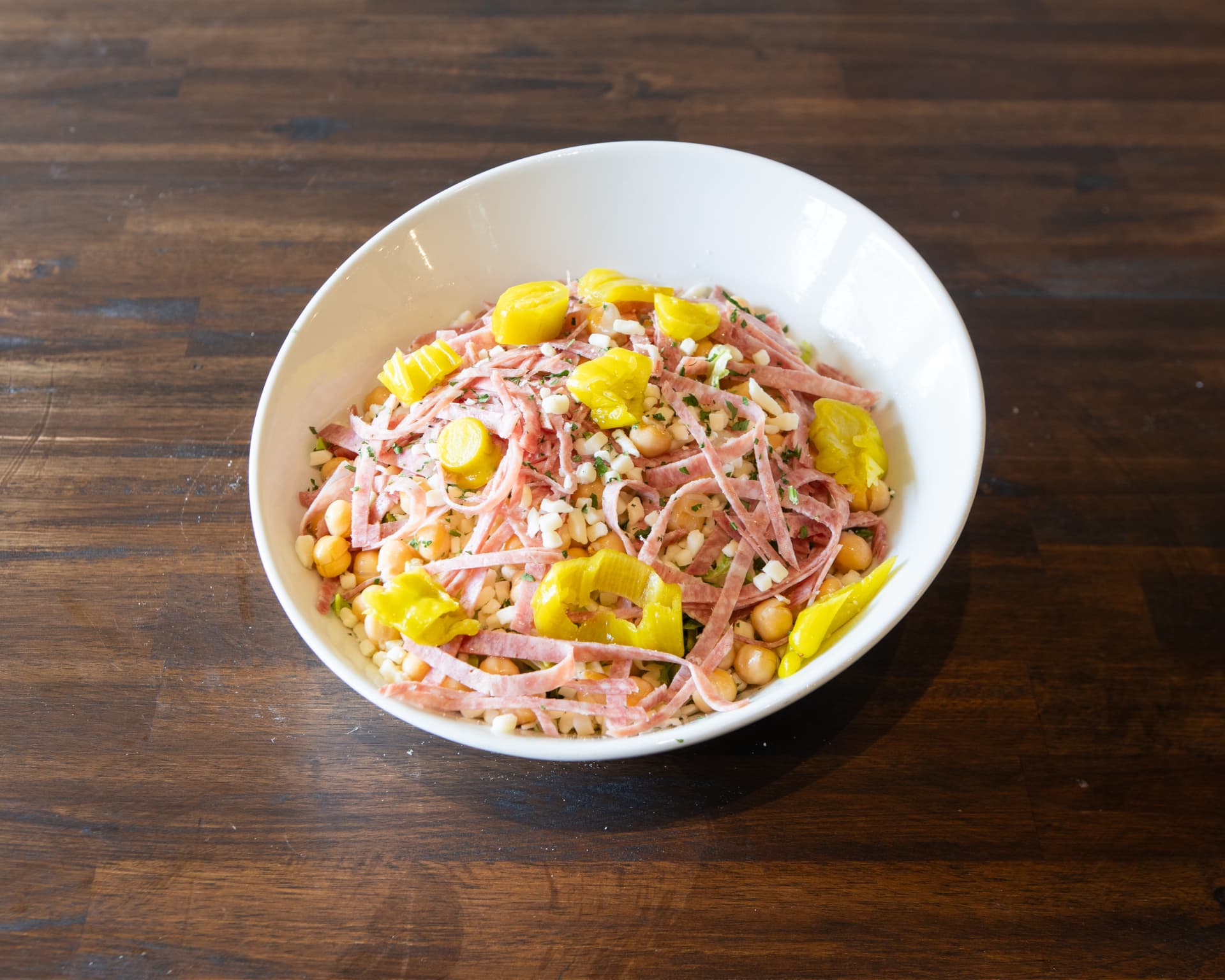 Paseo chopped salad with salami, chickpeas, provolone and pepperoncini
